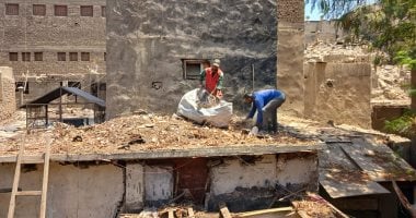 انطلاق حملة تنظيف أسطح المباني بشارع المعز في القاهرة.. صور 2025