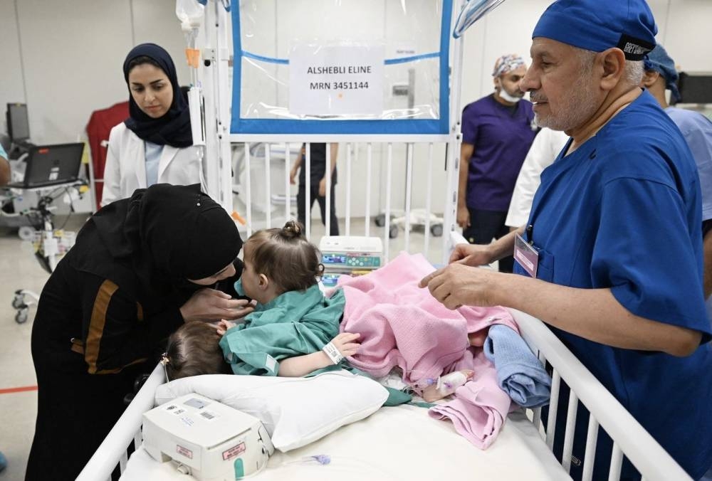 بناءً على توجيهات القيادة.. انطلاق جراحة فصل التوأم السوري سيلين وإيلين في 2025