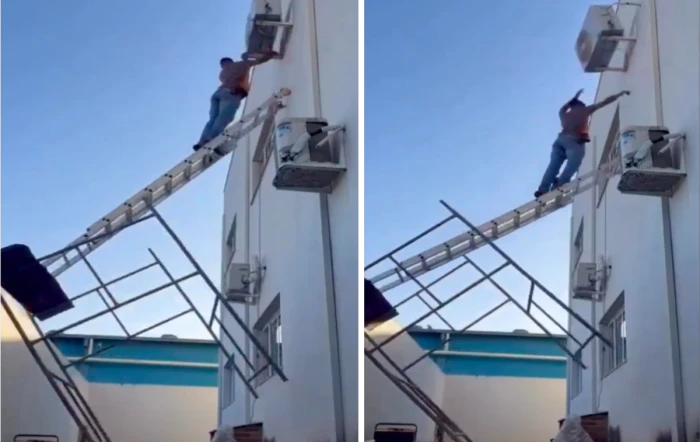 شاهد بالفيديو.. عامل يتعرض للسقوط من سلم مرتفع أثناء رفع وحدة تكييف